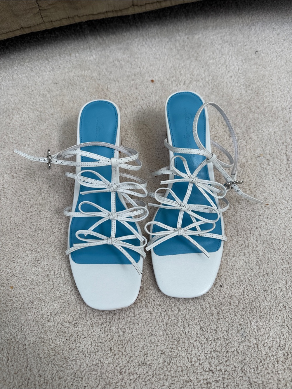 Womenโs White Strappy Slide Sandals